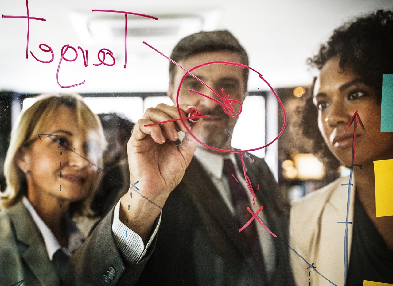 business people discuss outsourced marketing
